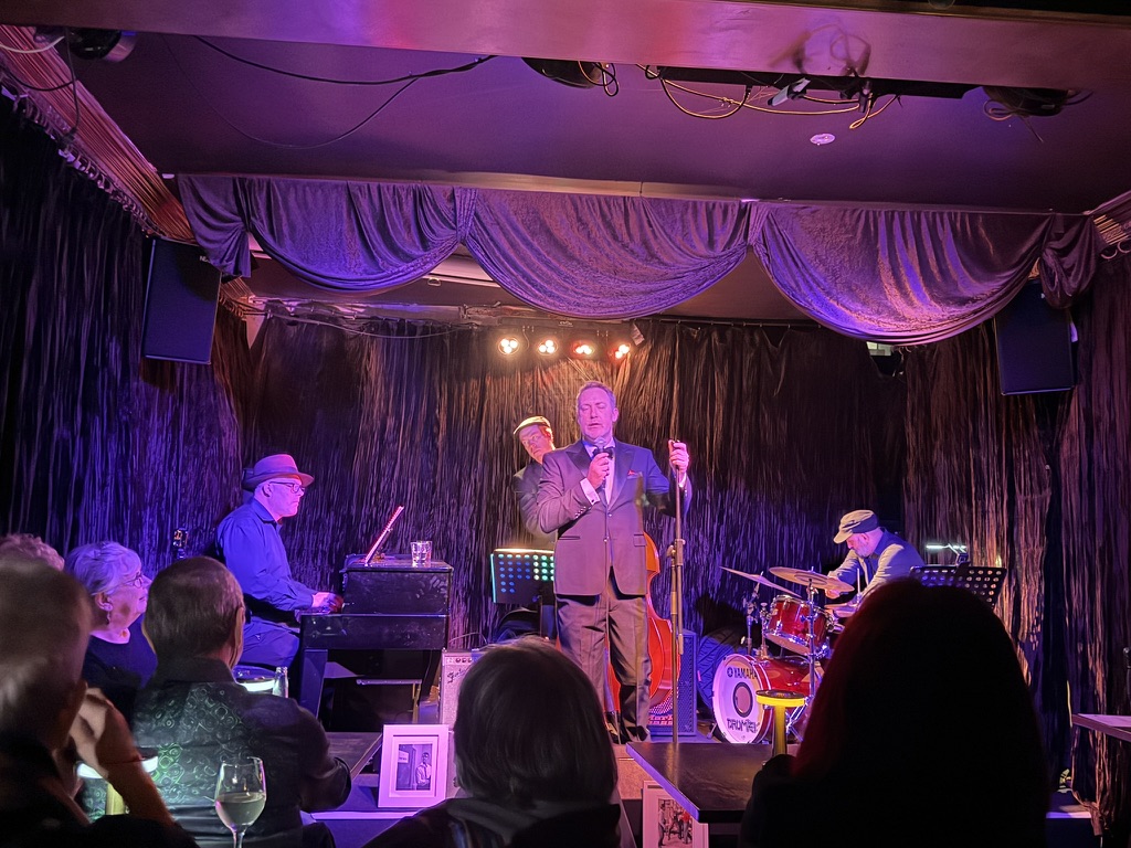 Wade Morgan performing with jazz ensemble at Paris Cat Jazz Club